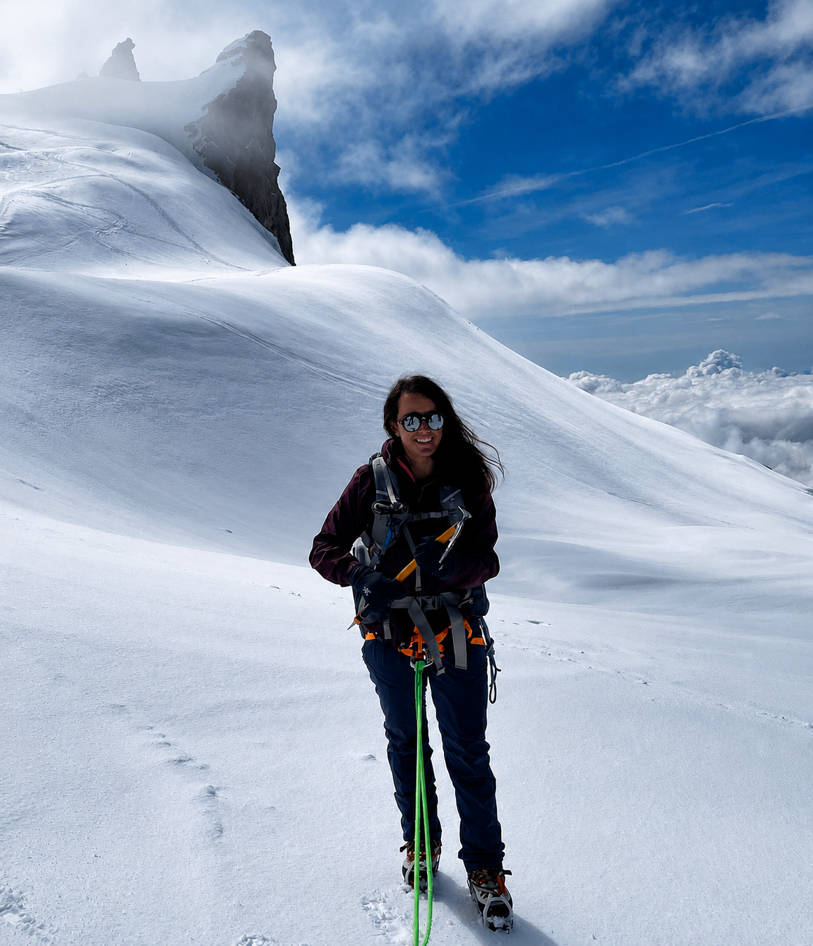 Mountaineering on a snowy alpine ridge